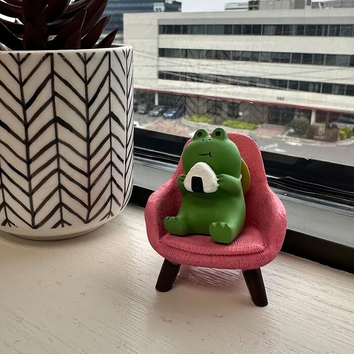 Your Coworkers Will Be Green With Envy When They See This Adorable Miniature Frog Figurine Perched On Your Desk