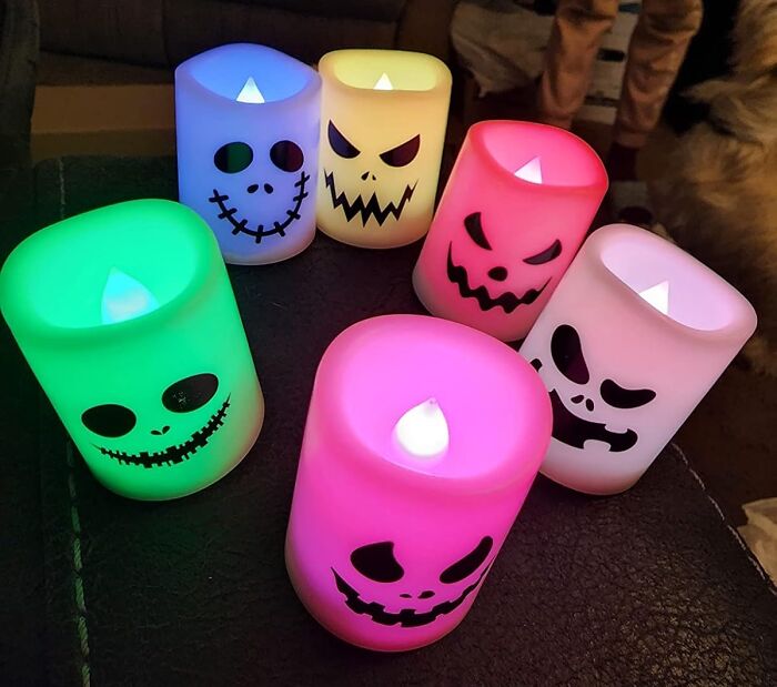 Light Up Your Halloween Without Setting The House On Fire With These Grinning Flameless Candles