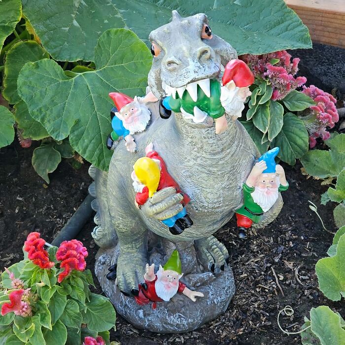 Your Plants Will Be Dino-Mite Happy With This Adorable Dinosaur Gnome Statue Watching Over Them!