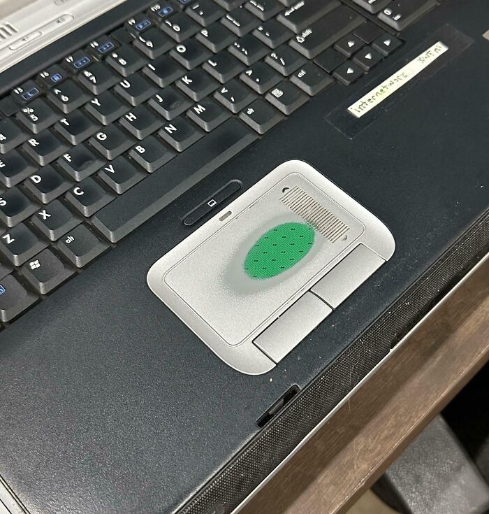 My Boss's Laptop's Trackpad Is Worn Down To The Circuit Board