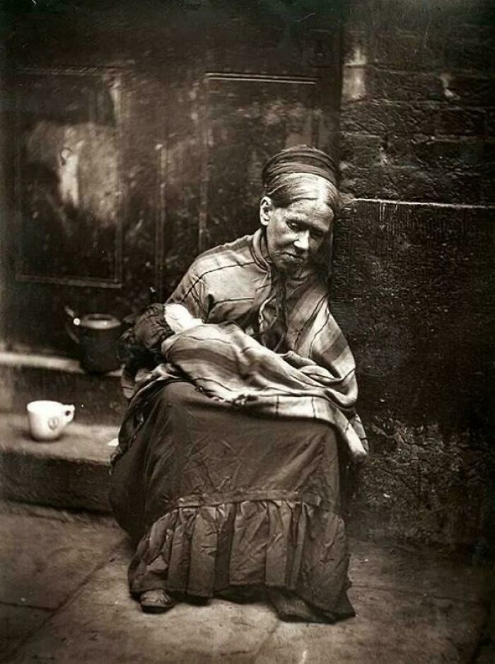 A Mother And Her Child In Spitalfields, One Of The Worst Slums In London, 1903