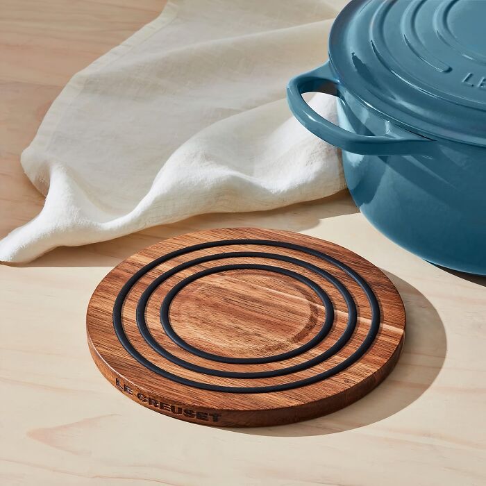 Hot Dishes Causing Countertop Chaos? This Magnetic Wooden Trivet Sticks Around To Save The Day 