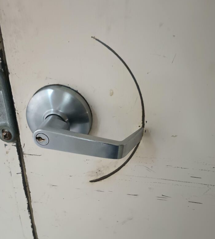 This Handle Has Visibly Worn Down The Door Due To Years Of People Turning It