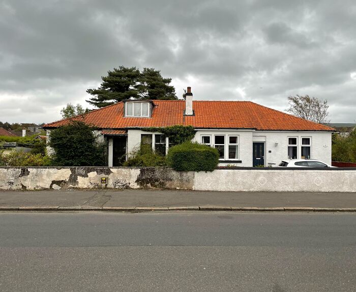 The Difference In Upkeep On Both Sides Of These Semi-Detached Houses