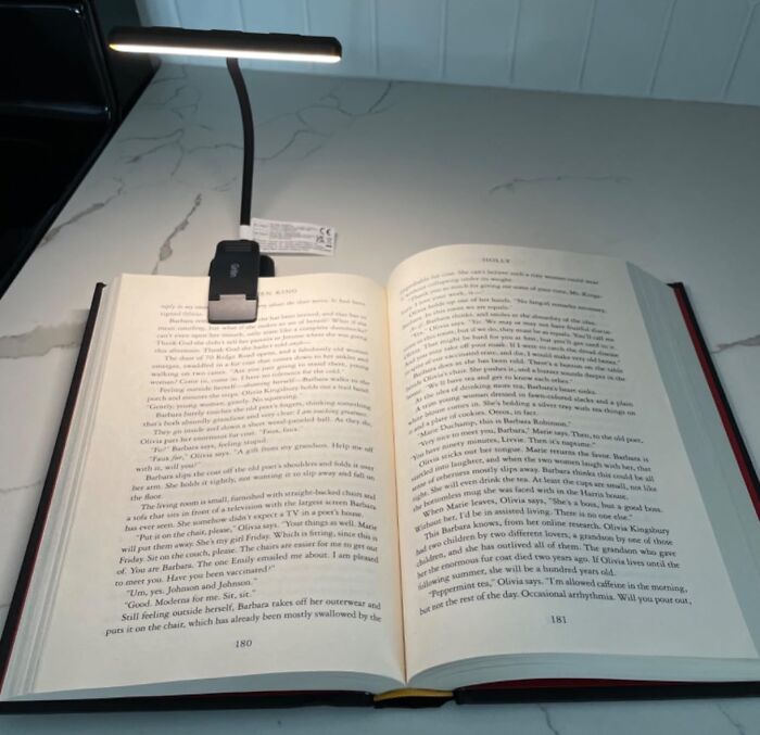 Late-Night Reading Sessions Got You Feeling Like A Vampire? This Rechargeable Book Light Will Illuminate Your Page Without Disturbing Your Partner