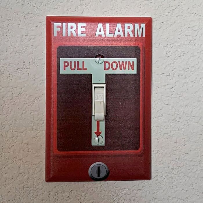 This Fire Alarm Light Switch Cover Really Speaks To Your Inner High School Prankster