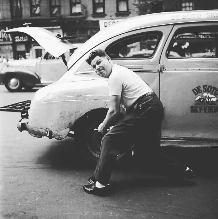 Stanley Kubrick's 1947 Photograph Of A New York Taxi Driver Changing A Tire