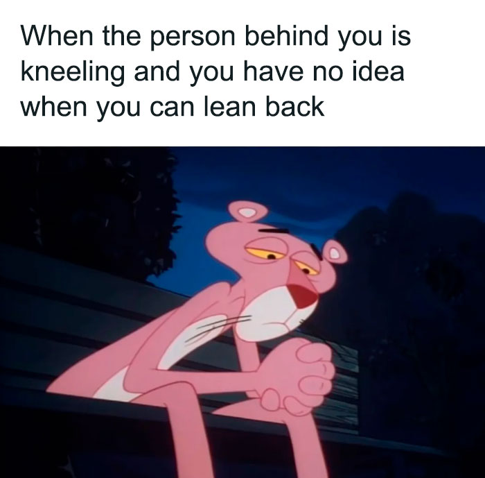  A Christian meme featuring an image of the Pink Panther sitting on a bench with a confused and anxious expression, hands clasped together as if deep in thought. The caption above reads, "When the person behind you is kneeling and you have no idea when you can lean back." The meme humorously captures the awkward and uncertain moment in a church setting when someone is unsure about when it's appropriate to lean back after a person behind them starts kneeling.