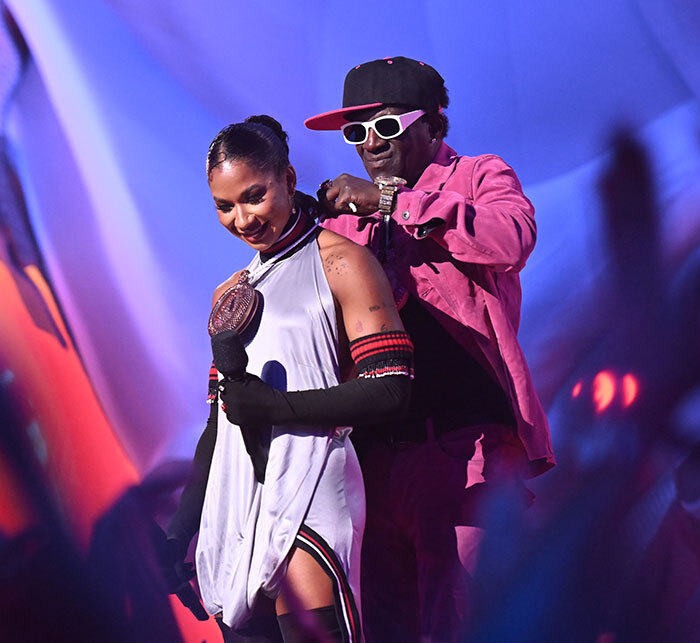 Jordan Chiles Emotional As Flavor Flav Gifts Her A Bronze Clock At VMAs: “You Deserve Everything”