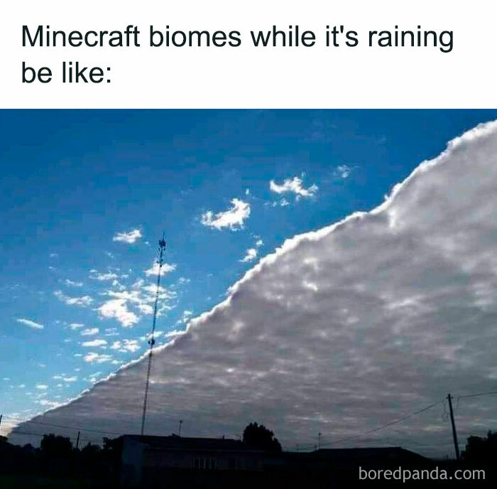 A Minecraft meme showing a real-life photo of the sky where a distinct line separates clear blue sky from dense cloud cover, mimicking the abrupt weather changes in the game. The text at the top reads, "Minecraft biomes while it's raining be like," humorously comparing the sharp boundary between the weather conditions in the photo to the way weather abruptly changes between biomes in Minecraft.