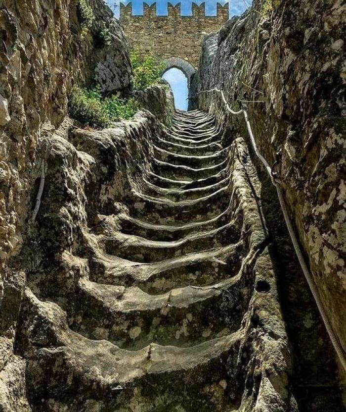 Worn Rock-Hewn Stairs Dating Back To The 11th Century Ce, Leading To The Sperlinga Castle In Sicily, Italy