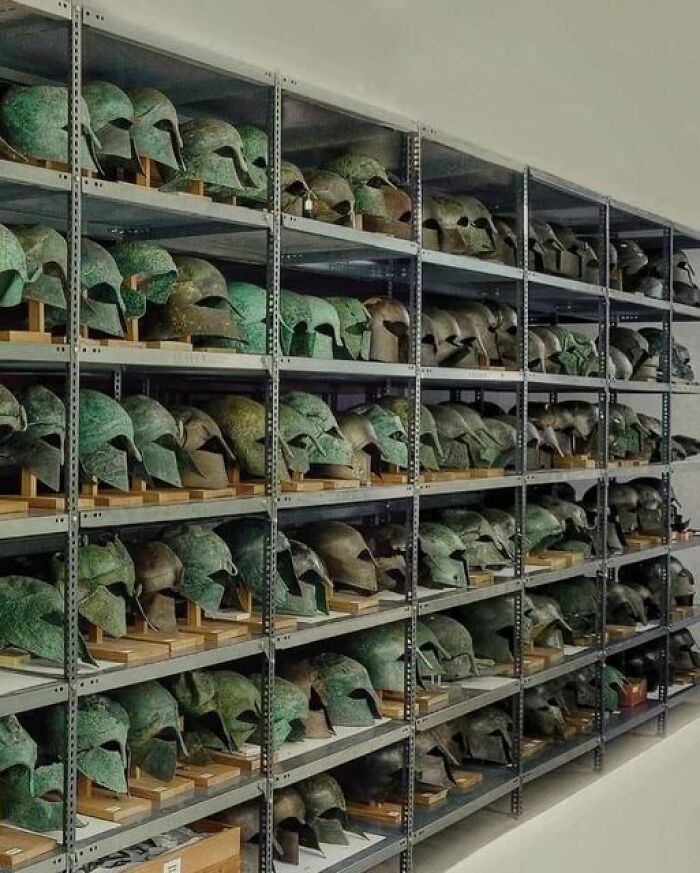 Ancient Greek Helmets From The Classical Period Kept In The Storeroom Of The Archaeological Museum Of Olympia In Greece