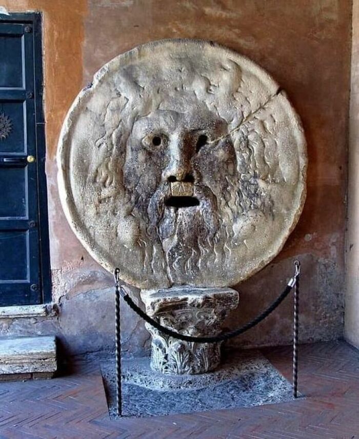 The Mouth Of Truth (Bocca Della Verità) Is A Large, Ancient Marble Mask Located In Rome, Italy