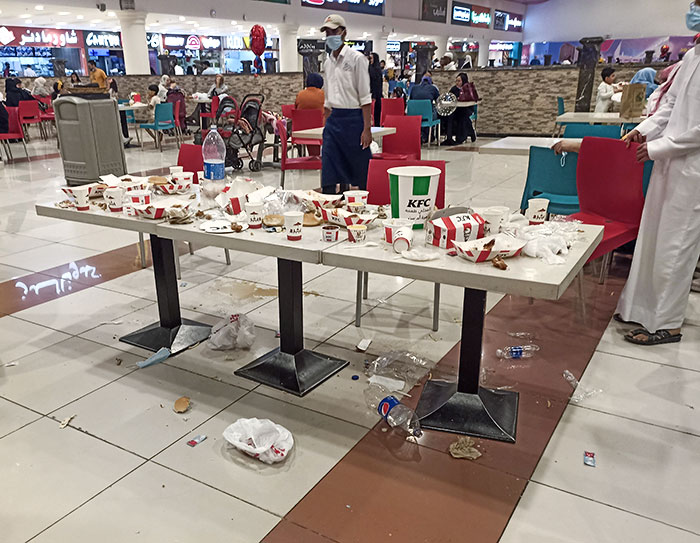 The Big Family Behind Us At The Food Court Left Like This