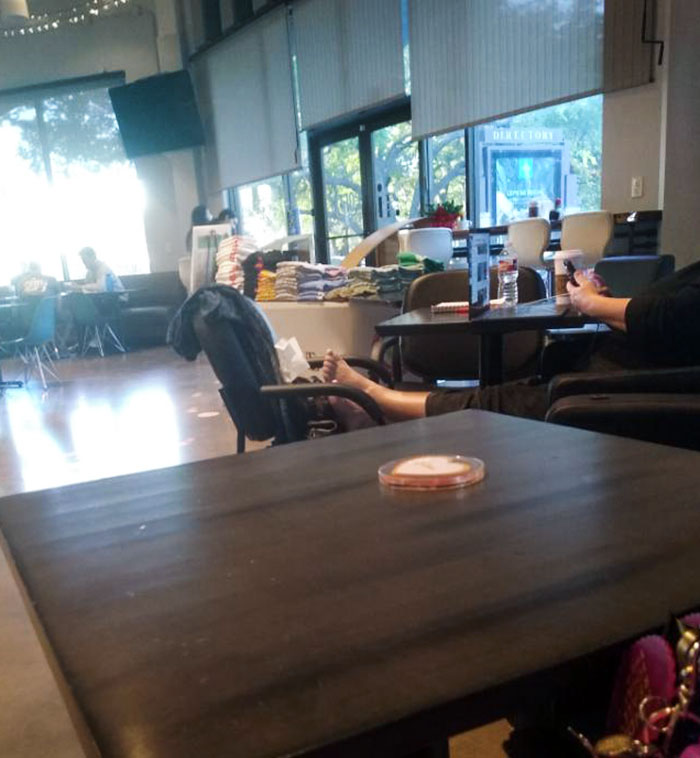 Some Woman At The Coffee Shop Has Her Bare Feet On A Chair