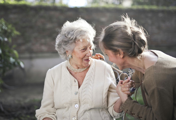 Grandmother and granddaughter sharing a happy moment, highlighting the grandkids relationship.