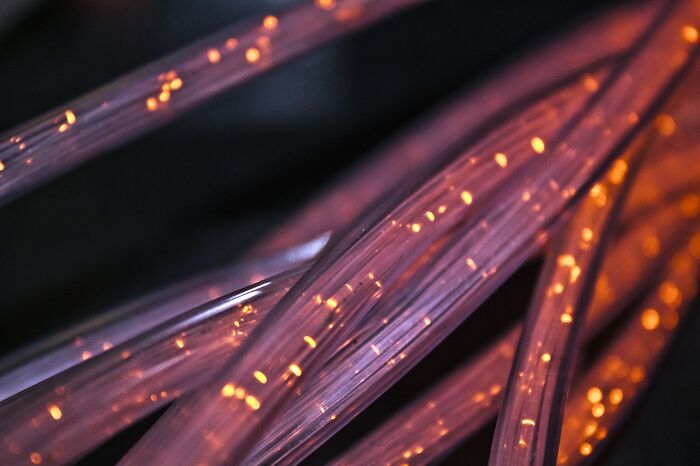 Glowing fiber cables close-up.