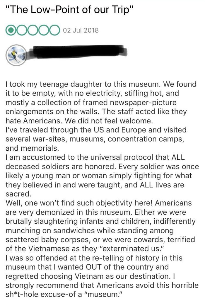 American Tourist In A Museum In Vietnam