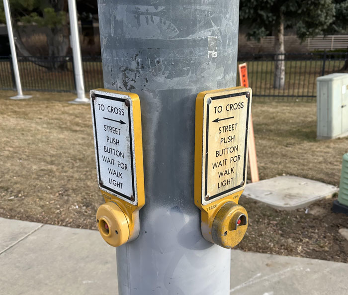 Walk Sign That Sees No Sunlight vs. Sign That Gets Direct Sunlight