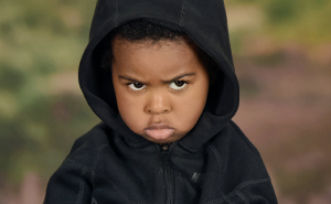 Mom Shares Angry Son’s First School Photos That Are So Hilarious Netizens Can’t Help But Laugh