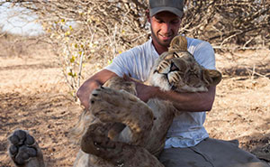 This Lioness Repays Her Caregiver Of 13 Years With Hugs And Cuddles