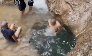 Man Jumps Off Cliff Into Water Hole And Completely Disappears, People Frantically Search For Him