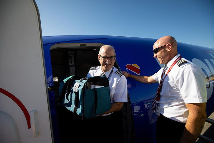 Airlines Help Evacuate Shelter Animals, Pilot Falls In Love With A Kitty And Decides To Adopt Her