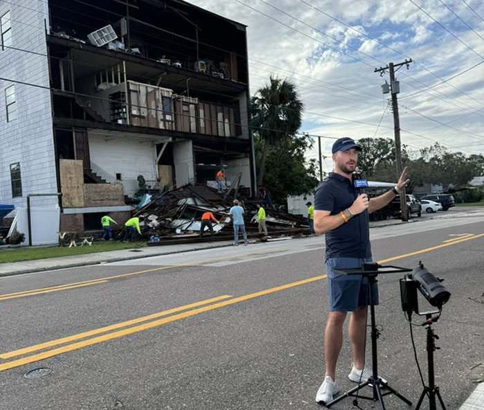 Reporter Arrives To Check Hurricane's Damage And Is Met By Fluffy Survivor