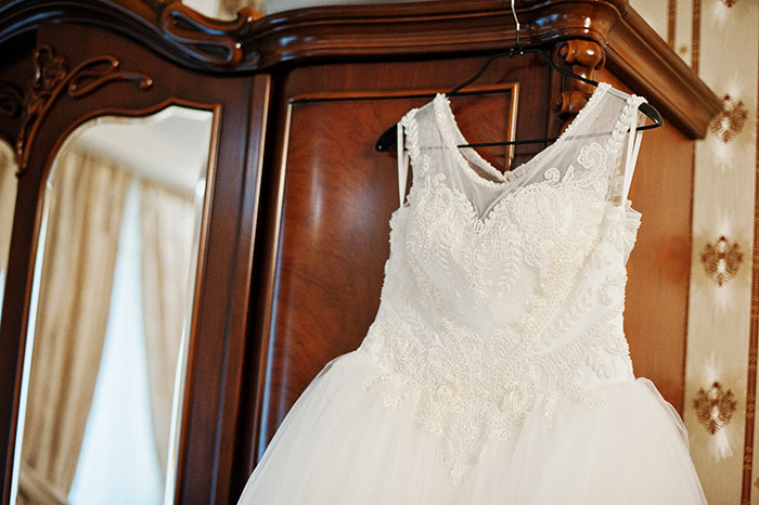 Woman Secretly Dyes Sister's Wedding Dress: "I Hope Your Husband Cheats On You"