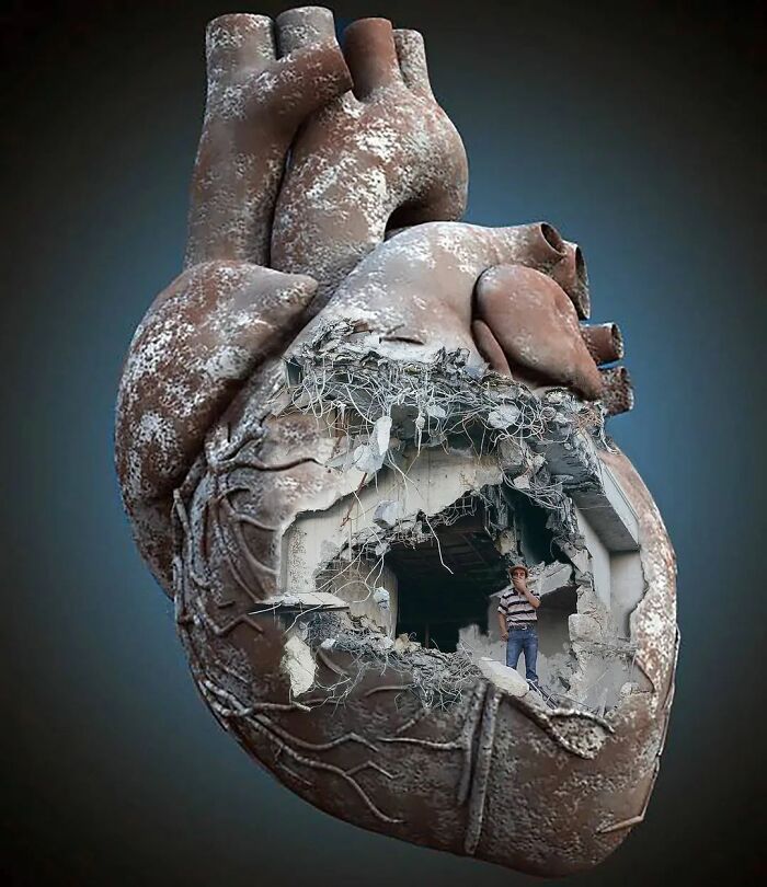 Surrealism artwork of a human heart with a person standing in a cavernous opening.