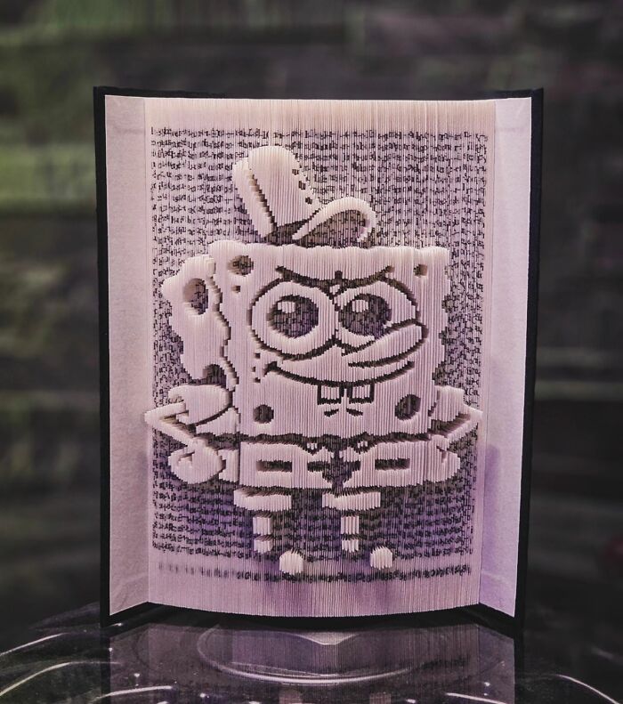 From Pages To Pixels: The Enchanting Sculptures Of Book Master