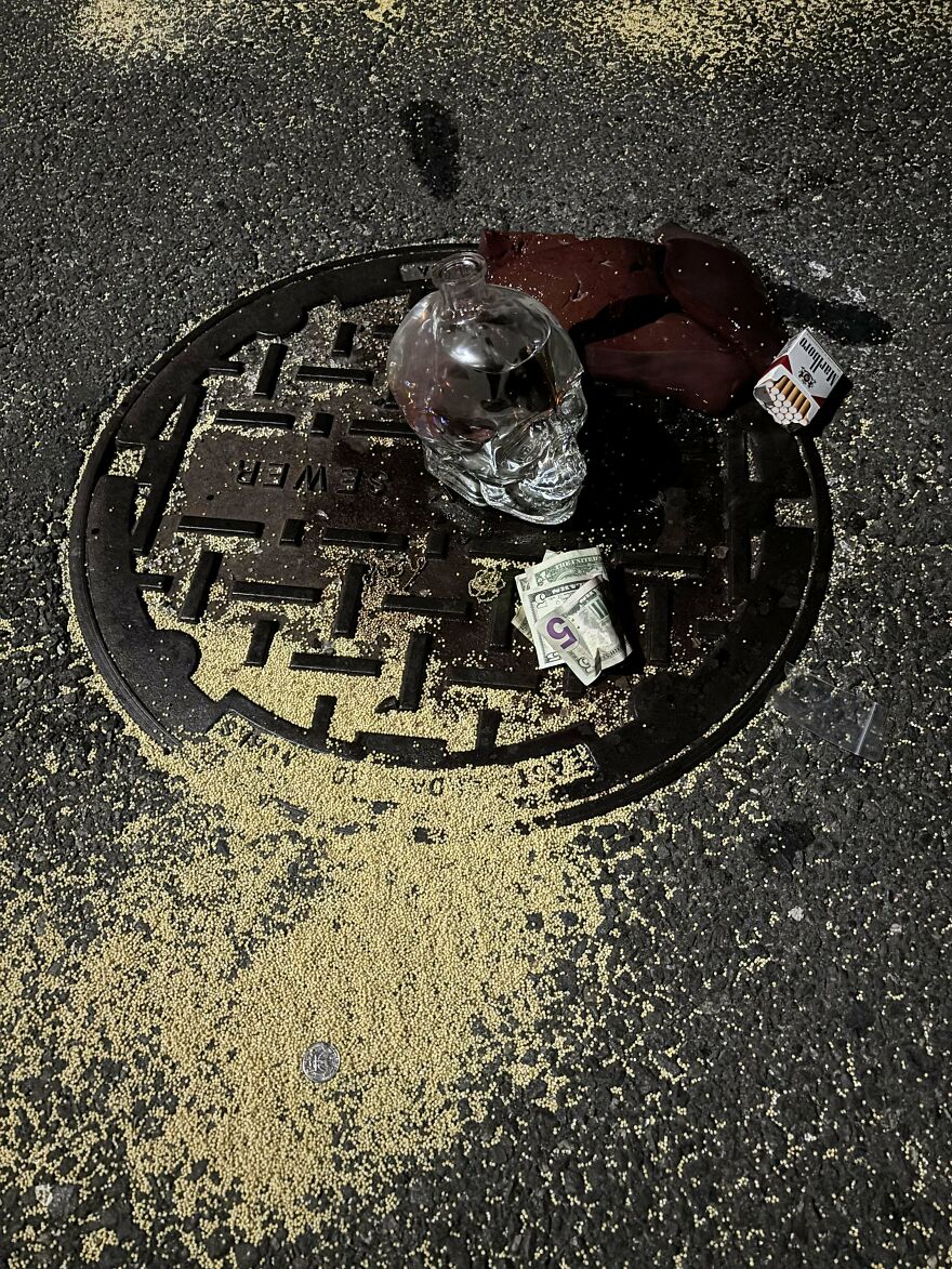 Someone Keeps Leaving Stashes Of Liquor, Cigarettes, Meat Products And Money In The Middle Of The Road And Foot Paths Around My Town