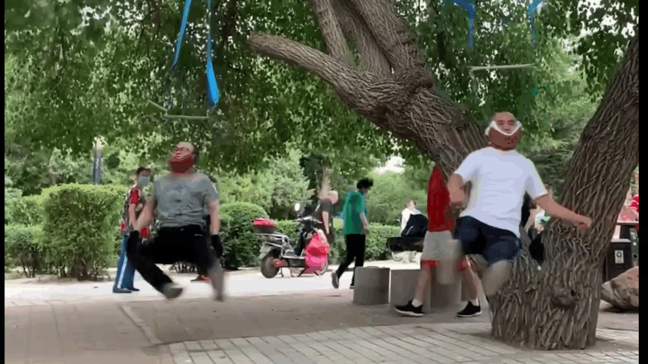 Elderly People In China Doing "Neck Exercises"