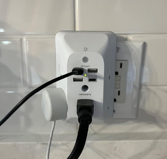 An Outlet Extender With Night Light Is Essential In A Tech Savvy Household