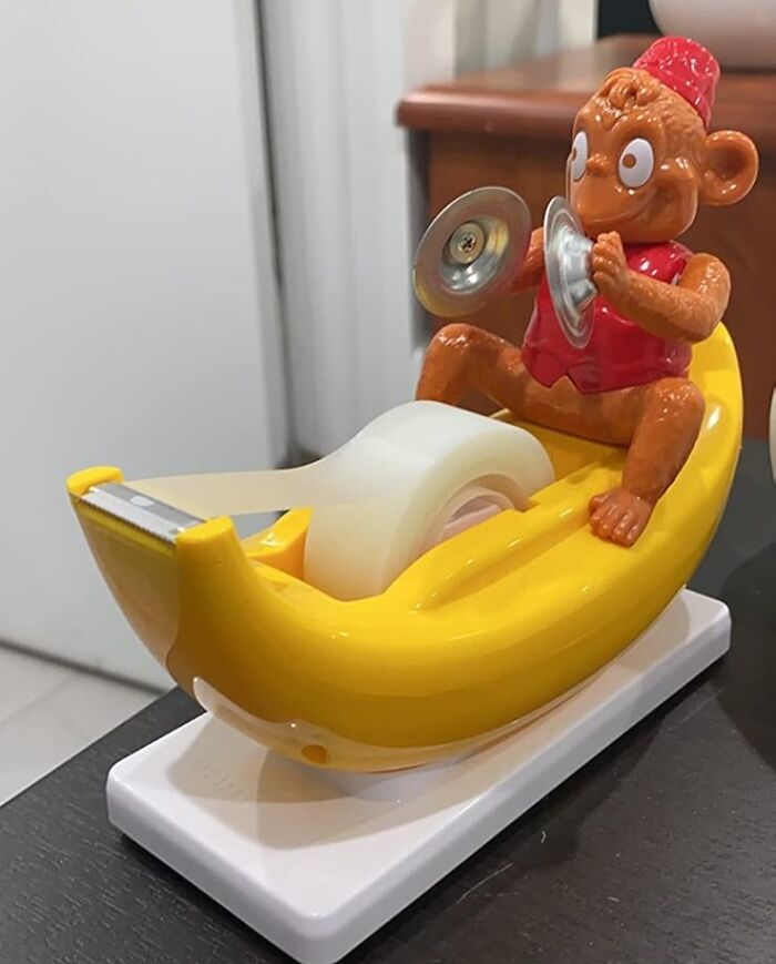  This Tape Dispenser Perfectly Reflects That "Play Monkey, Play" Feeling We Get From A Desk Job