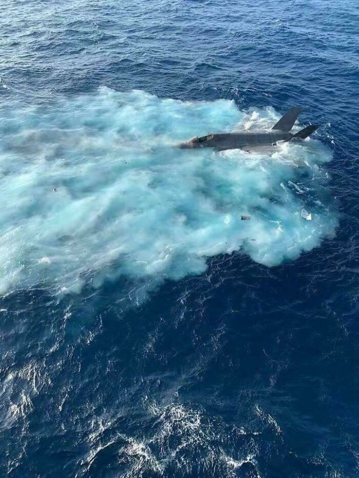 Jet partially submerged in the ocean, symbolizing an unfortunate incident with potential costly consequences.