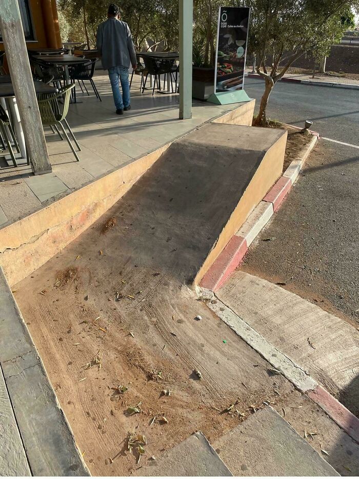 Dangerous Wheelchair Ramp. Even If You Can Climb This Ramp With Your Wheelchair, There Are No Guardrails To Protect You From Falling And Hurting Yourself