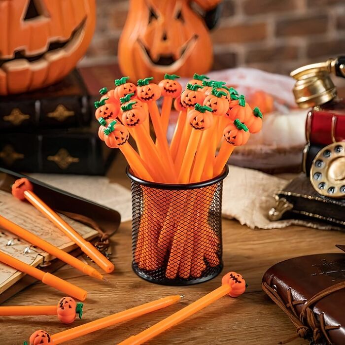 Overwhelm Your Coworkers With An Avalanche Of Seasonal Cheer (And Mediocre Writing Utensils) With This Bulk Pack Of Halloween Pumpkin Pens