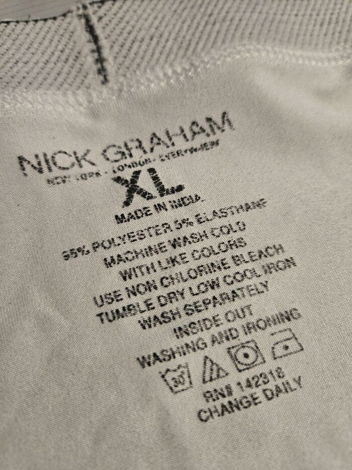 Clothing label from Nick Graham showing care instructions, an example of something mildly interesting.