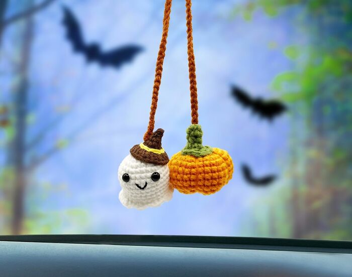 Your Rearview Mirror Just Got A Boo-Tiful New Friend With This Crocheted Ghost And Pumpkin Duet That's Hanging Around To Bring Some Spooky Charm To Your Daily Drive