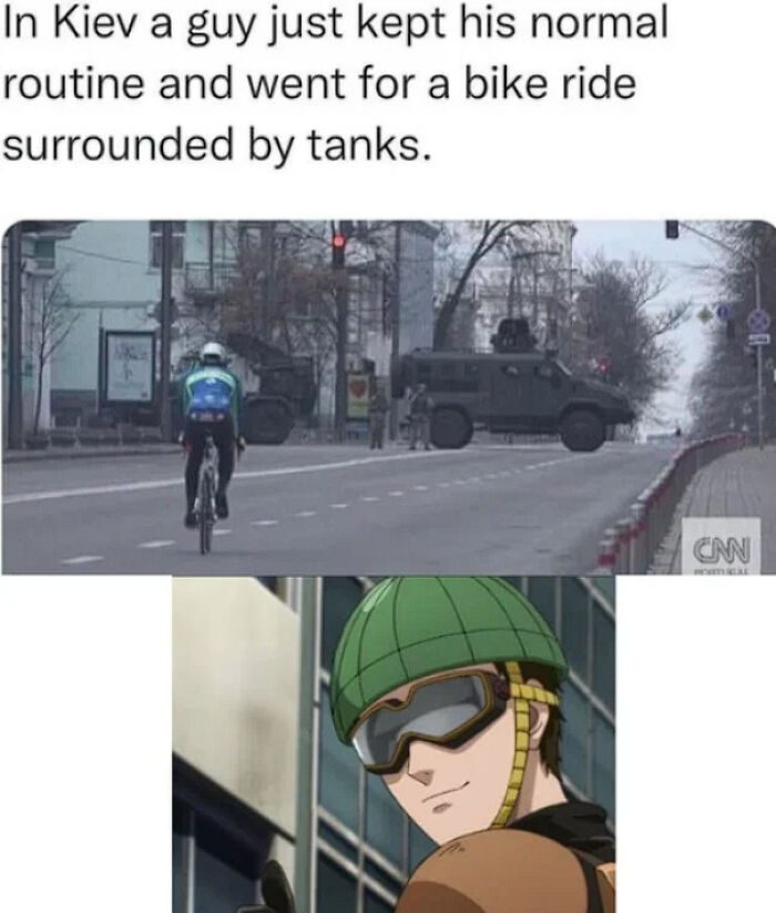 Cyclist rides in Kiev amidst tanks, depicted as a real-life "final boss" scenario with an anime character comparison.