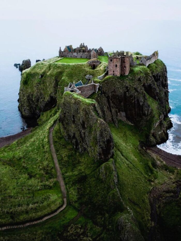 Dunnottar Castle, Located On A Rugged Headland On Scotland's Northeast Coast, Holds A Fascinating And Complex History