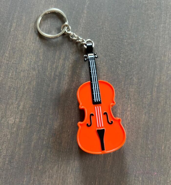 Play A Tiny, Impeccable Note Of Sympathy For A Friend With The World's Smallest Violin Keychain