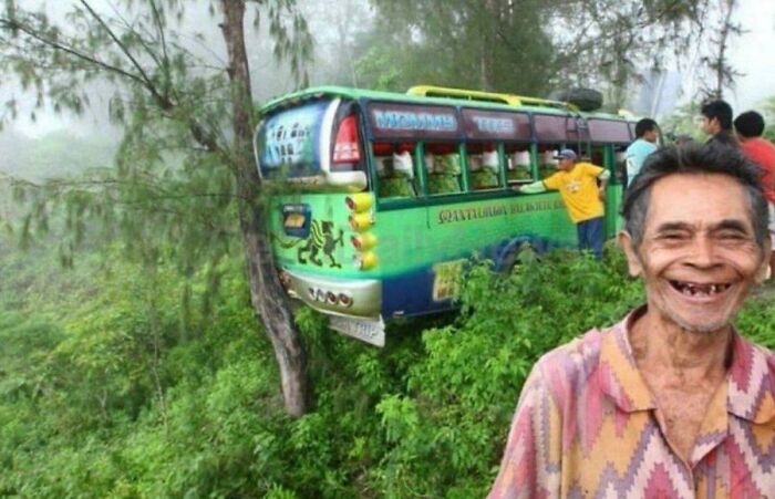 Guy Smiles For A Photo After The Tree He Planted 35 Years Ago That He Named Epimaco Amancio Saved A Bus From Plunging Off A Cliff In Dalaguete, Cebu, Philippines