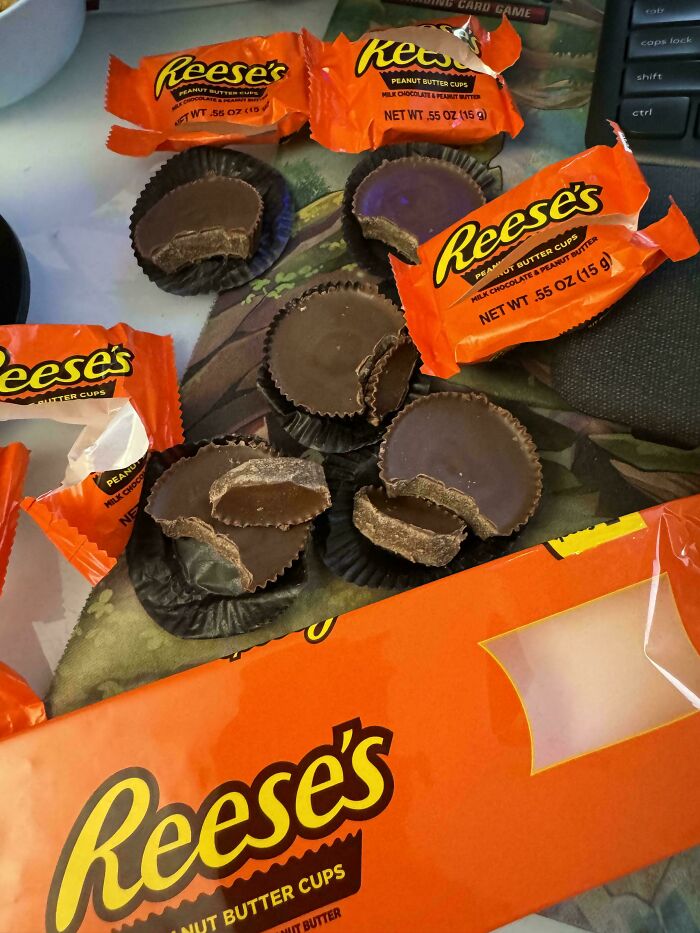 Reese's peanut butter cups with unusual thick chocolate bottoms, creating a mildly interesting observation.