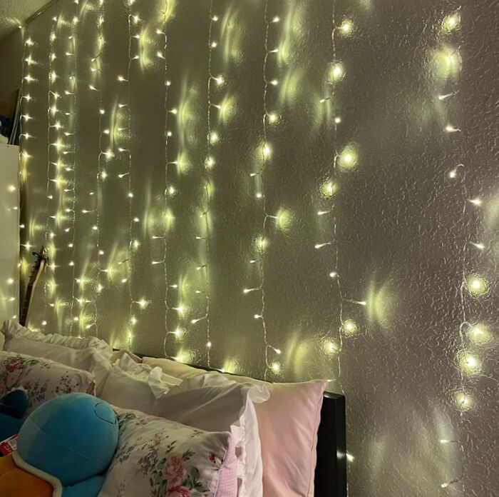 Add A Magical Touch To That Boring Beige Wall With Curtain Fairy Lights