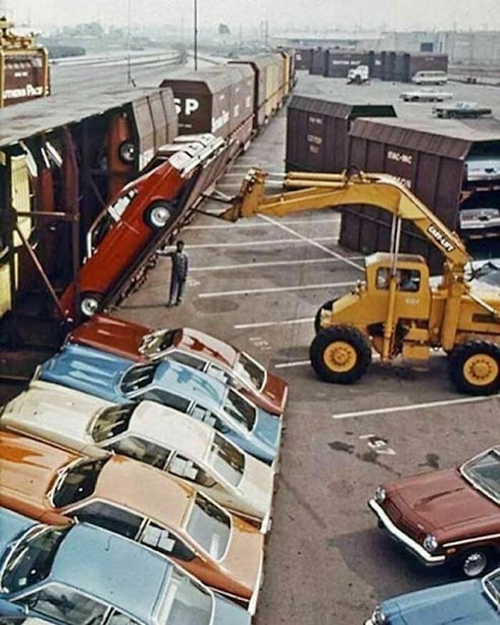 The Chevrolet Vega Being Loaded Vertically On A Specially Designed Railroad Car Called The Vert-A-Pac In 1971