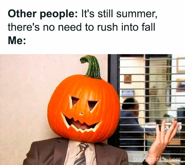 A Fall meme showing a person wearing a carved pumpkin as a head. The text reads, "Other people: It's still summer... Me:" suggesting eagerness for fall.