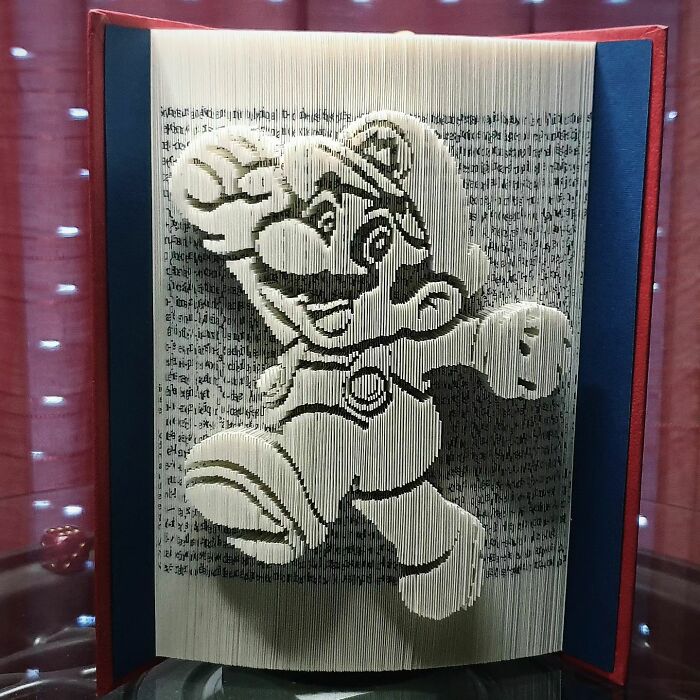 From Pages To Pixels: The Enchanting Sculptures Of Book Master