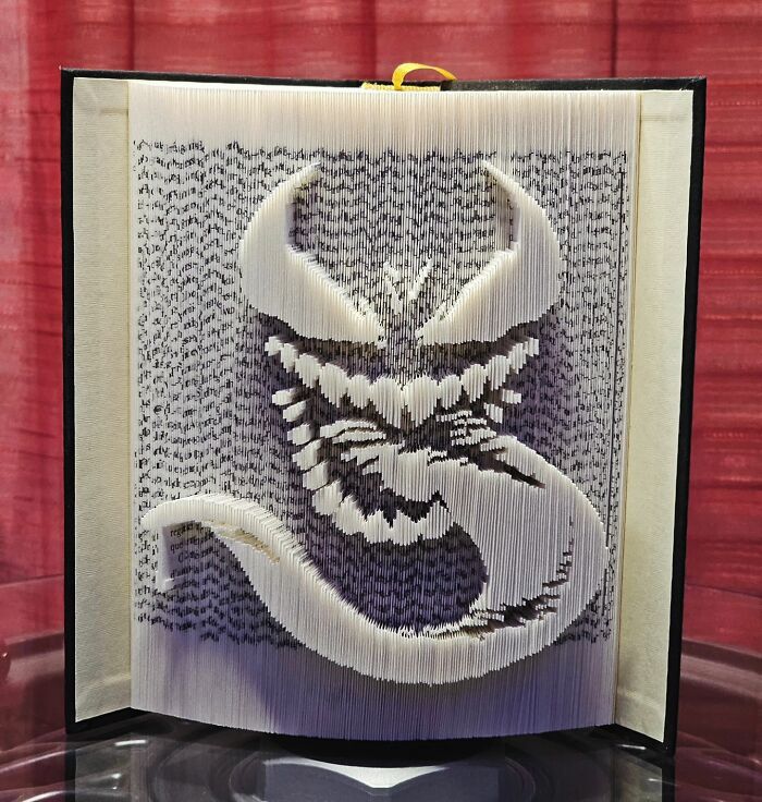 From Pages To Pixels: The Enchanting Sculptures Of Book Master